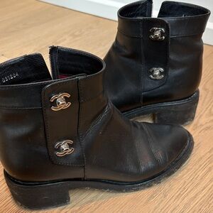 CHANEL Black Leather Ankle Booties with Silver Accents